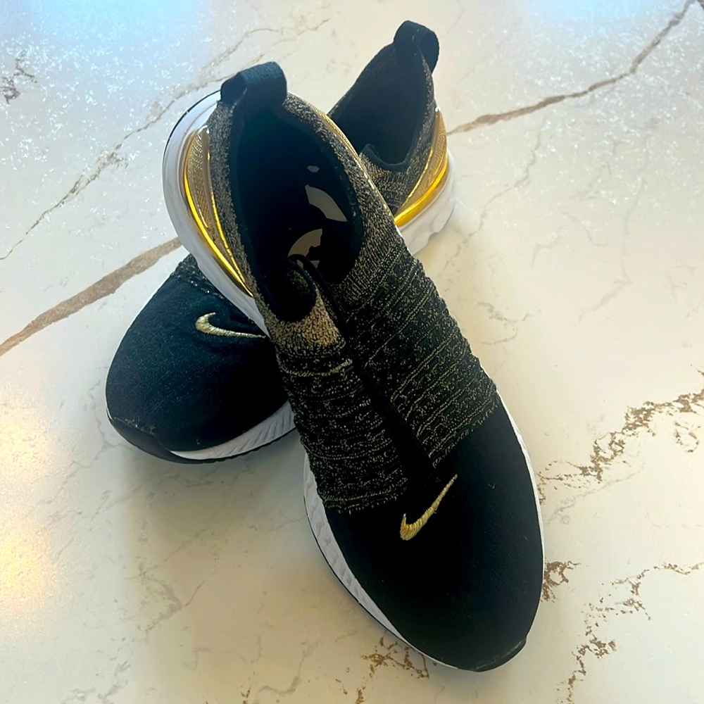 Women’s React Phantom Run Flyknit 2 Premium Nike. Size 9. Black/White & Gold.